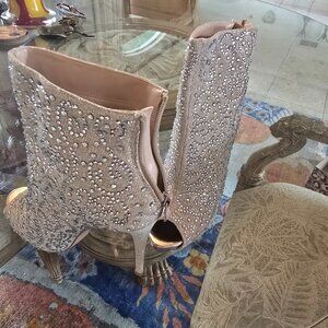 four pairs of booties/ ll sent to you for 200.00 great deal